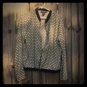 Black and cream zippered patterned jacket